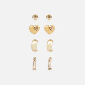 Ensemble de quatre boucles d'oreilles dorées variées